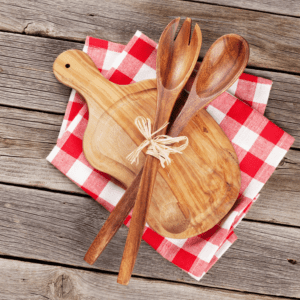 Wooden utensils on a checkered cloth