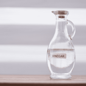 Clear vinegar bottle with label