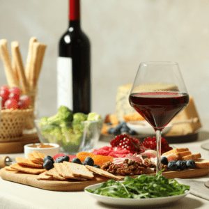 Red wine and assorted appetizers display