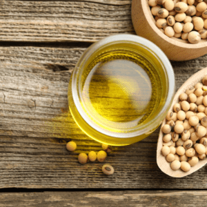 Bowl of soybeans with oil jar