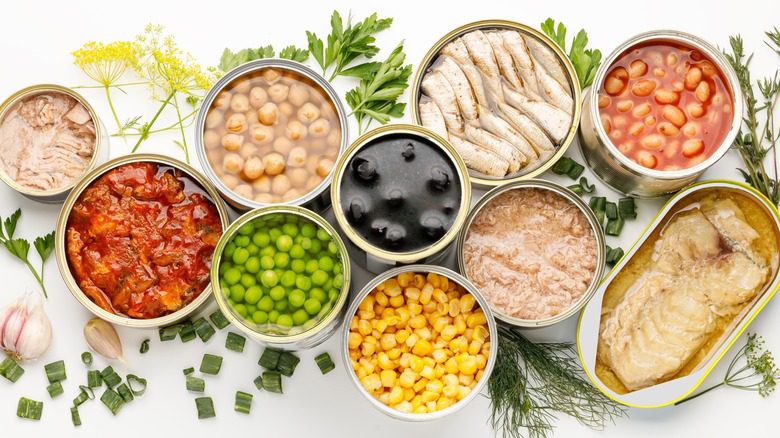 Assorted open canned foods and vegetables